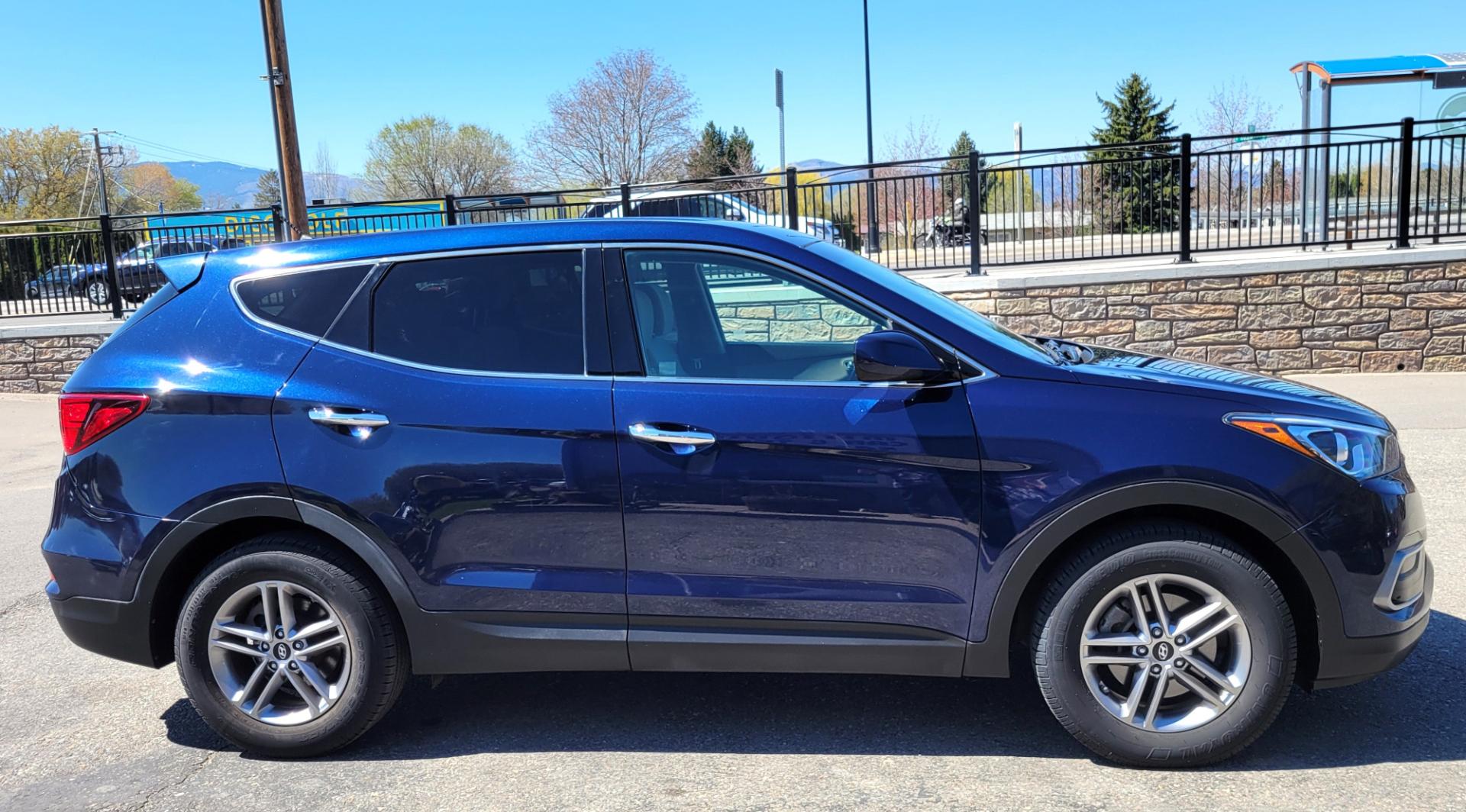 2018 Blue /Tan Hyundai Santa Fe Sport (5XYZTDLB0JG) with an 2.4L L4 engine, 6 Speed Auto transmission, located at 450 N Russell, Missoula, MT, 59801, (406) 543-6600, 46.874496, -114.017433 - Photo#0